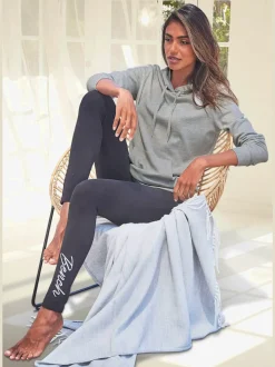 Sweatshirt à capuche avec poche kangourou et bords-côtes