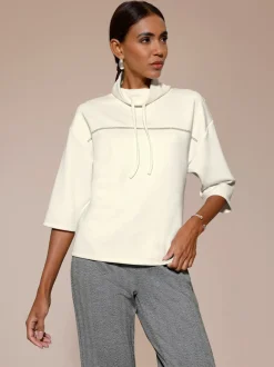 Sweatshirt à col roulé et manches 3/4 avec pierres fantaisie