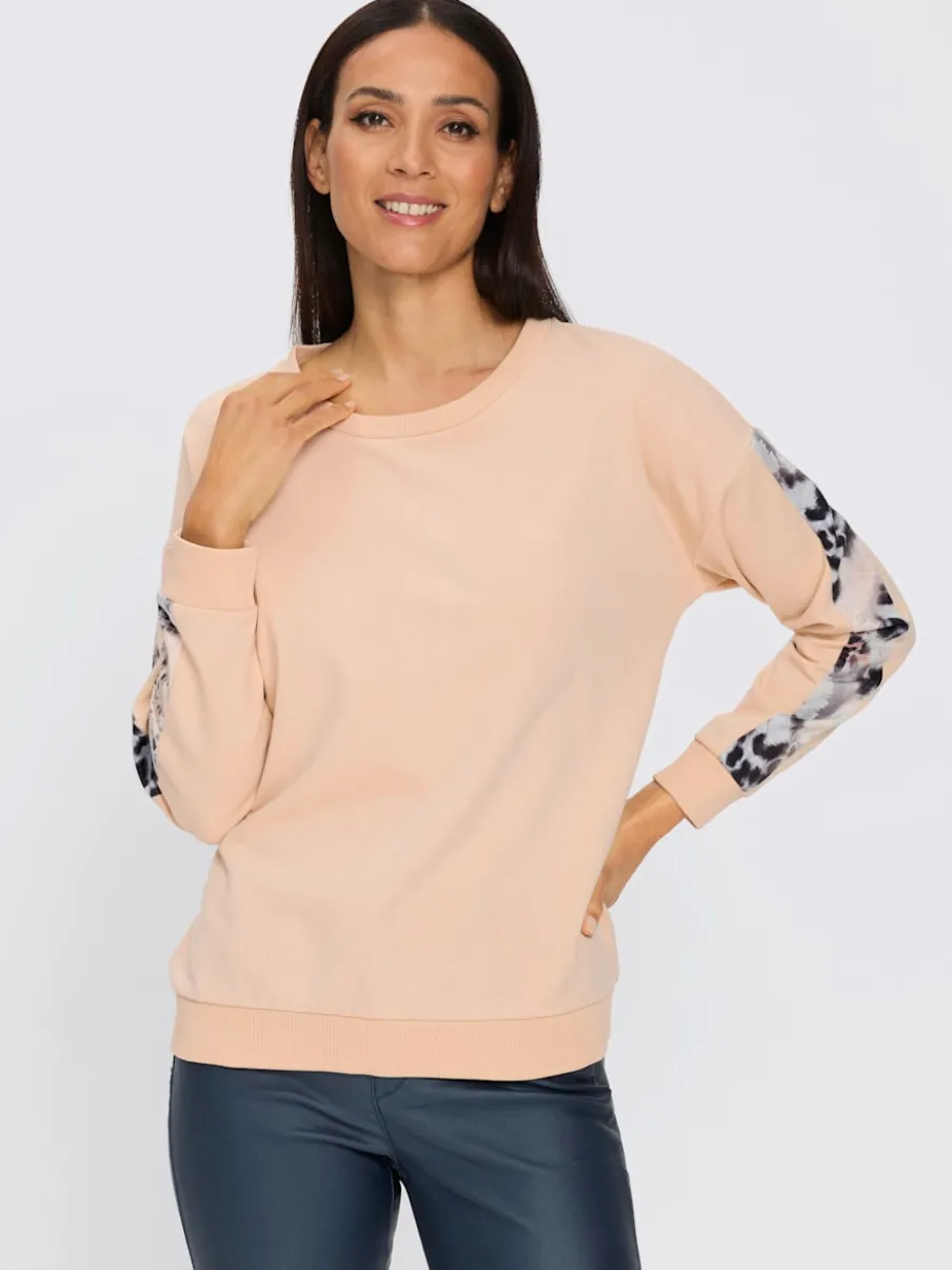 Sweatshirt confortable à encolure ronde avec motifs animaux sur les manches