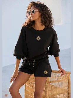 Sweatshirt à encolure ronde avec bords-côtes et coton doux