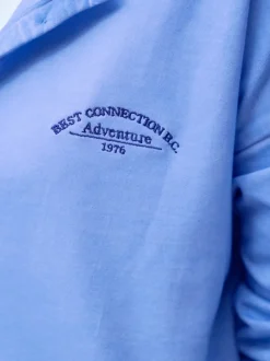 Sweatshirt en pur coton à encolure ronde avec patte de boutonnage et manches longues