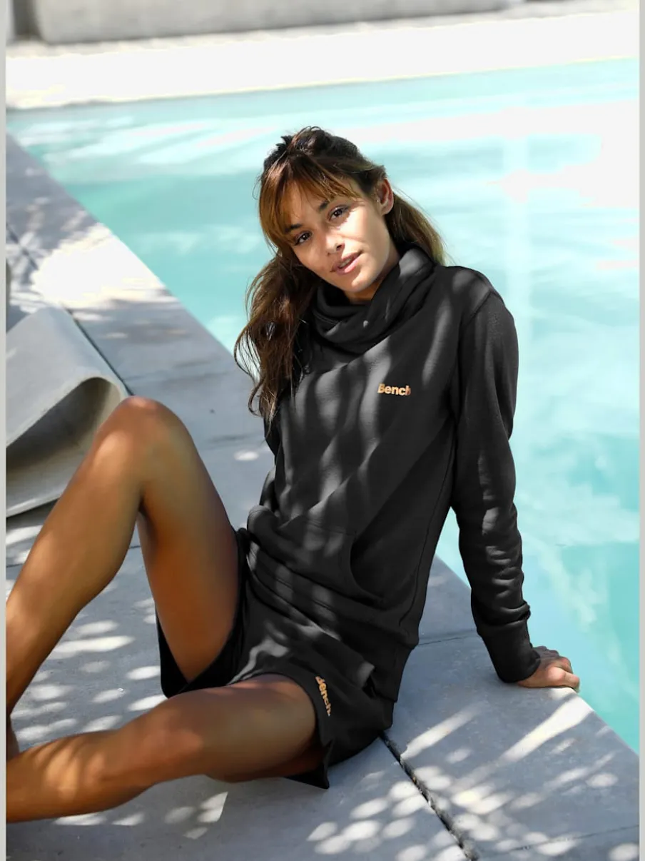 Sweatshirt long à col revers avec poche kangourou et logo cuivre
