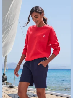 Sweatshirt à manches longues avec broderie ancre et cordon à l'ourlet