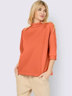 Sweatshirts en modal doux avec col montant et manches.