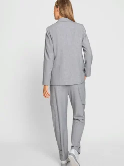 Tailleurs pantalons avec blazer col revers et poches