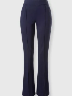 Tailleurs pantalons avec col à revers et manches bouffantes