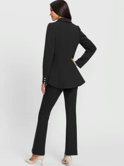 Tailleurs pantalons avec col à revers et manches bouffantes