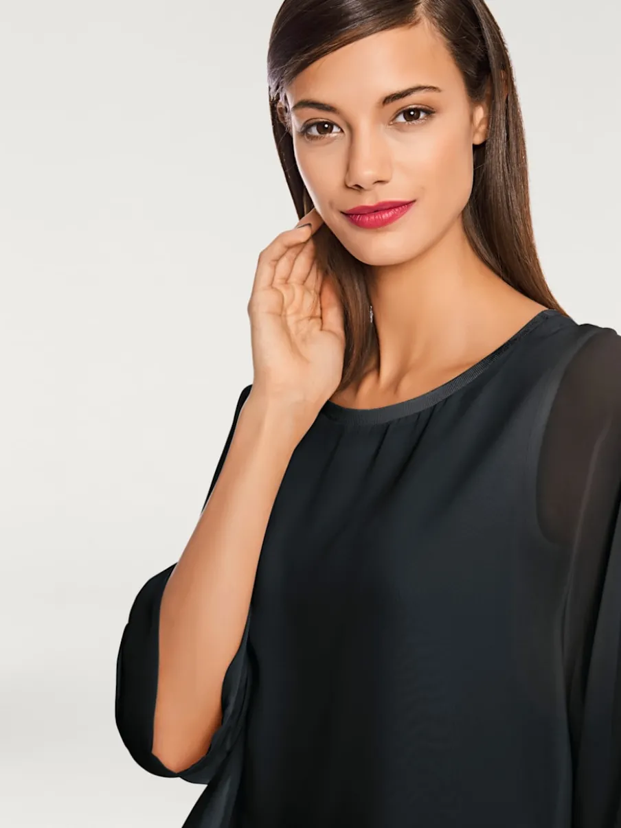 T-shirt ample avec col rond et manches 3/4 chauve-souris