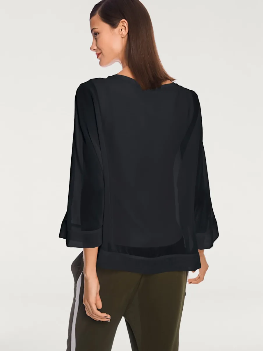 T-shirt ample avec col rond et manches 3/4 chauve-souris