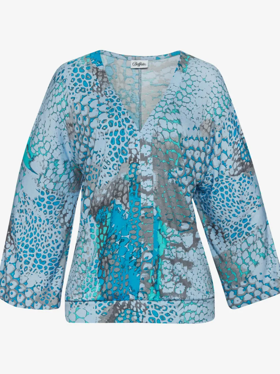 T-shirt ample à encolure en V dégagée avec imprimé unique