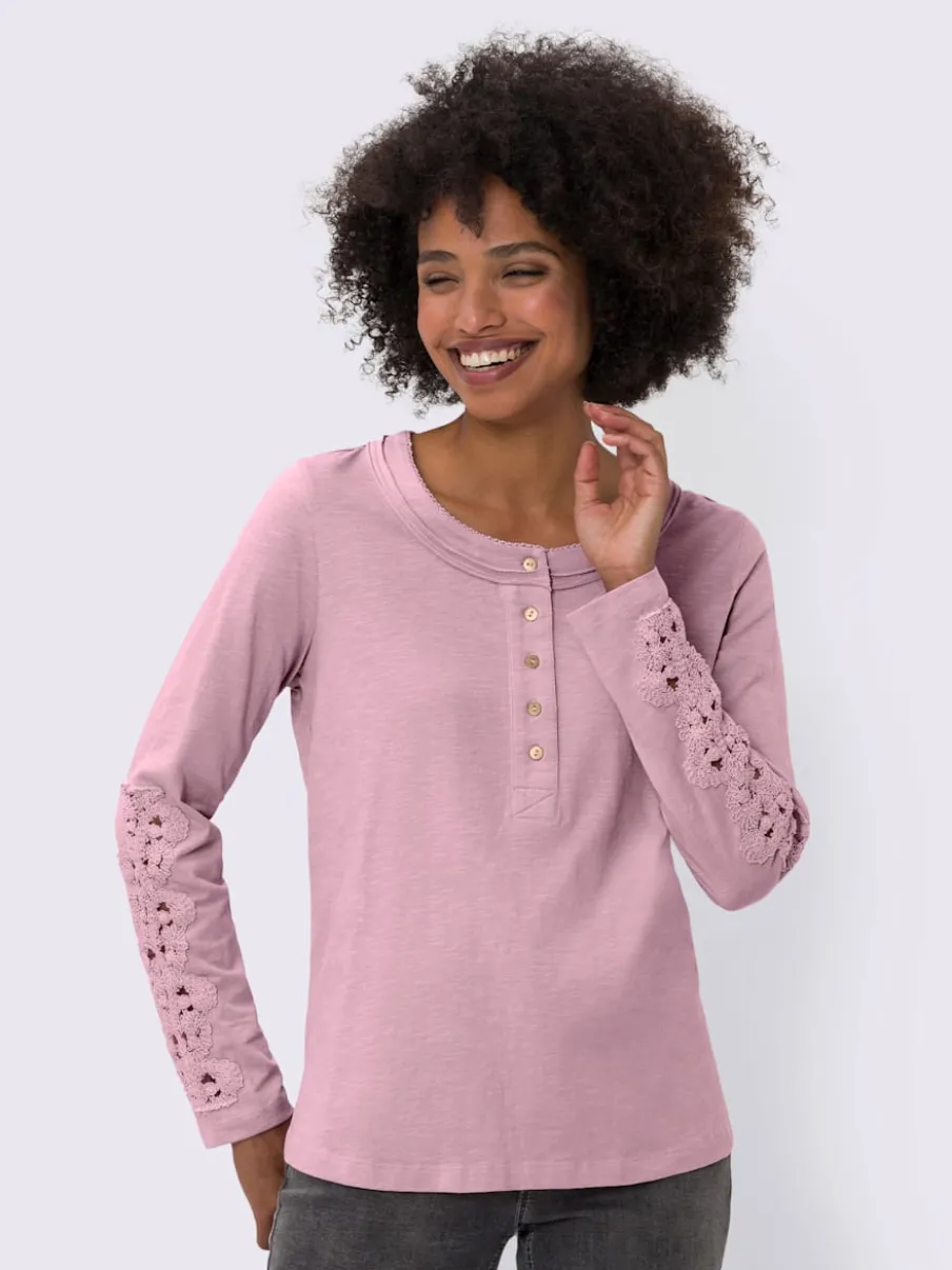 T-shirt à col rond avec délicat empiècement en dentelle et fentes latérales