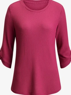 T-shirt à col rond avec manches 3/4 et boutons à l'ourlet
