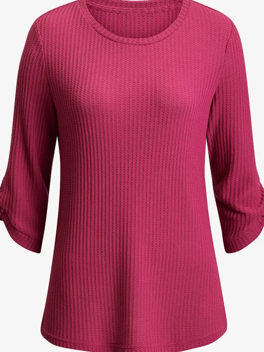 T-shirt à col rond avec manches 3/4 et boutons à l'ourlet