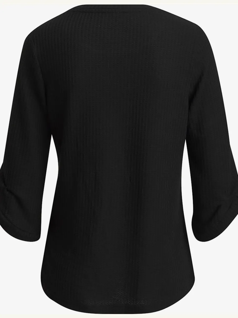 T-shirt à col rond avec manches 3/4 et boutons à l'ourlet