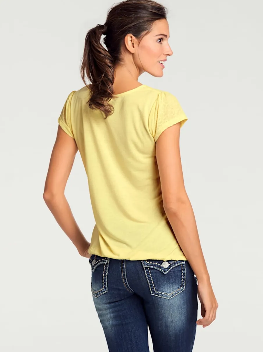 T-shirt à col rond avec motifs dévorés modernes