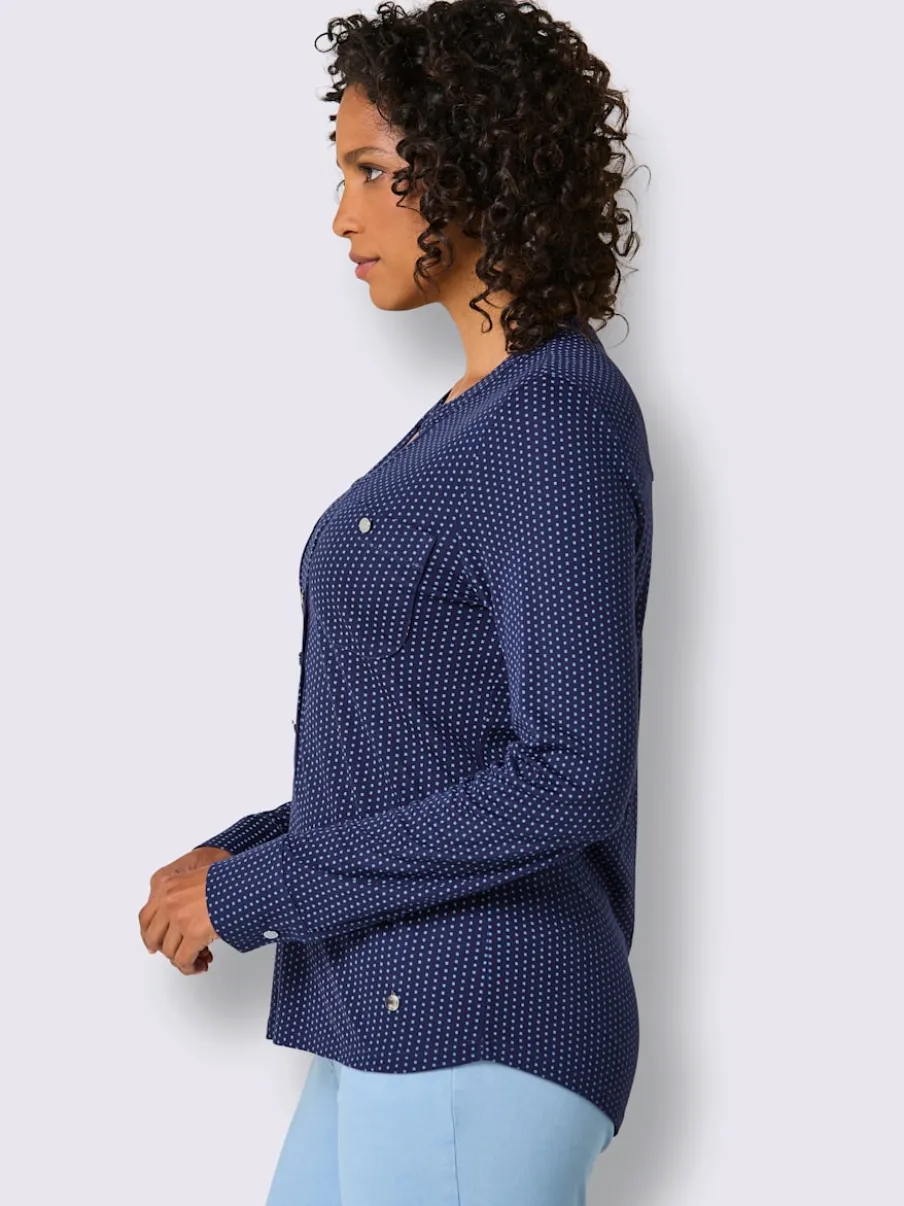 T-shirt à col V avec manches longues et motif à pois