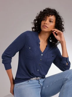 T-shirt à col V avec manches longues et motif à pois