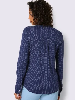 T-shirt à col V avec manches longues et motif à pois