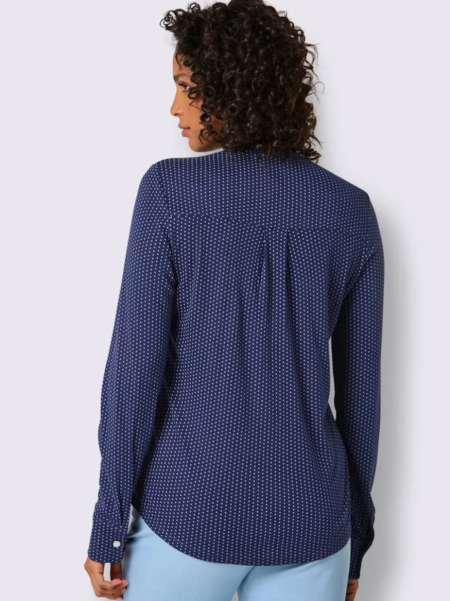 T-shirt à col V avec manches longues et motif à pois