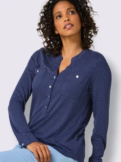 T-shirt à col V avec manches longues et motif à pois