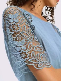 T-shirt à encolure ronde avec manches en dentelle transparente