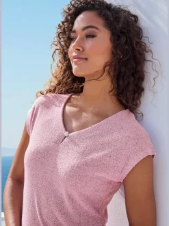T-shirt à encolure V avec bouton brillant et strass