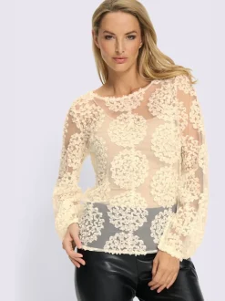 T-shirt en dentelle avec encolure ronde et manches longues ballon