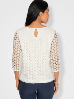 T-shirt en dentelle avec manches transparentes et fente