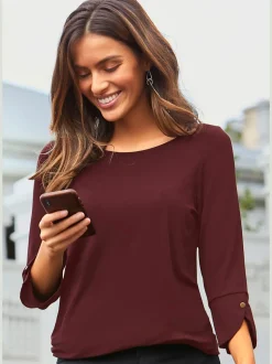 T-shirt à manches 3/4 avec boutons dorés et coupe décontractée