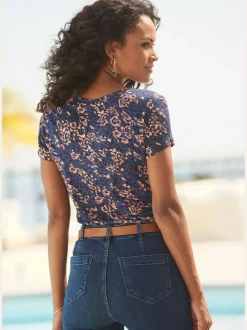 T-shirt à manches courtes avec découpe à l'encolure et motif floral
