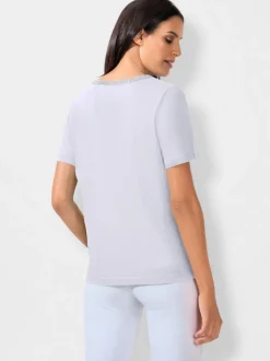T-shirt à manches courtes avec passepoil en V et empiècements floraux