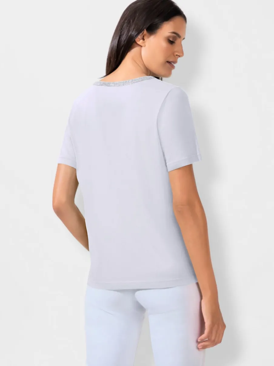 T-shirt à manches courtes avec passepoil en V et empiècements floraux