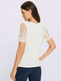 T-shirt à manches courtes en dentelle raffinée et asymétrique