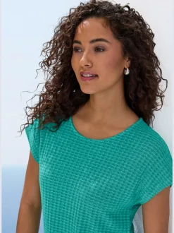 T-shirt à manches courtes en tricot avec motif graphique encolure ronde et élastique à la taille