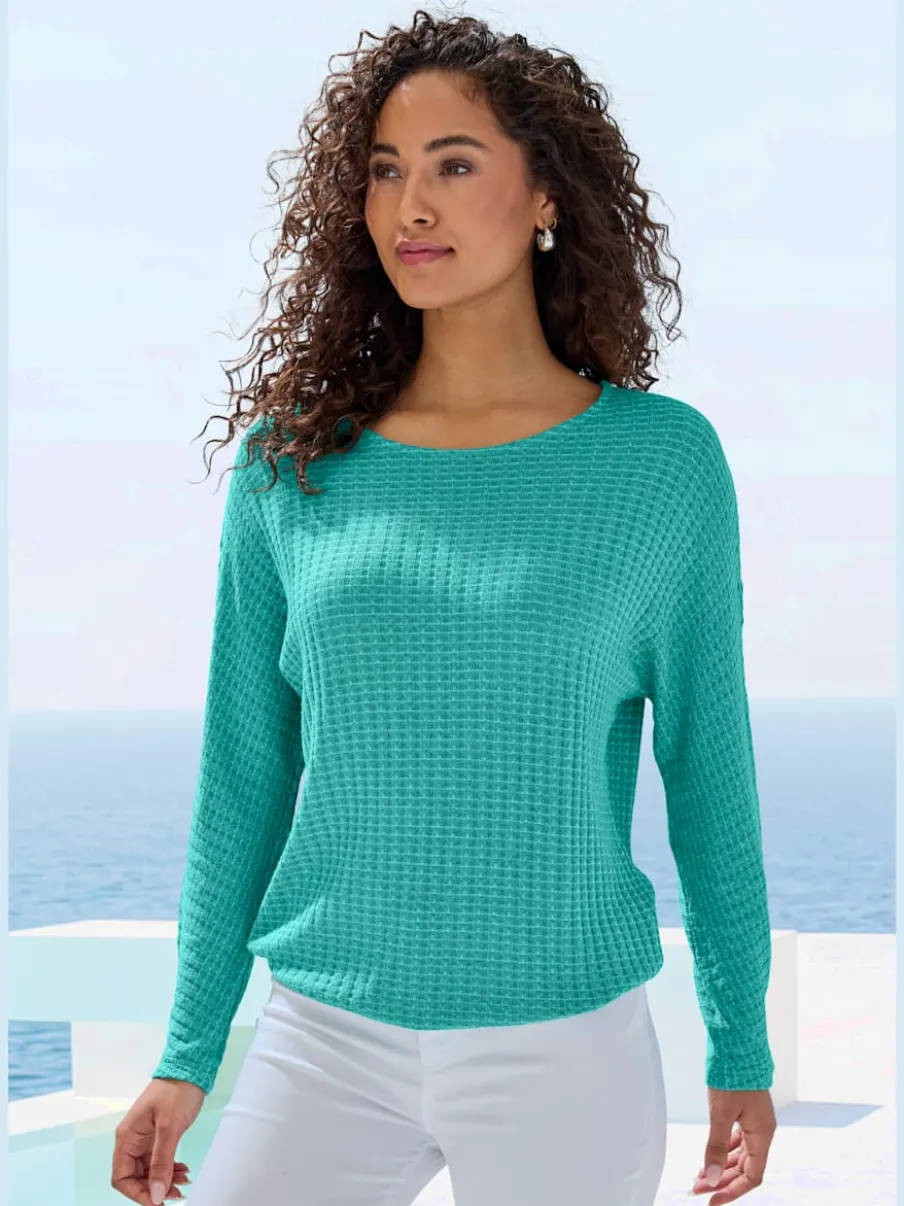 T-shirt à manches longues en tricot structuré avec encolure ronde et élastique à la taille