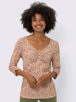 T-shirt à motifs mille fleurs avec manches trois quarts.