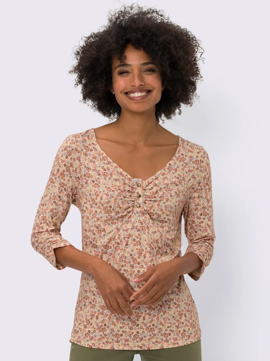 T-shirt à motifs mille fleurs avec manches trois quarts.