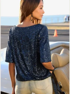 T-shirt à paillettes avec large encolure ronde et manches mi-longues
