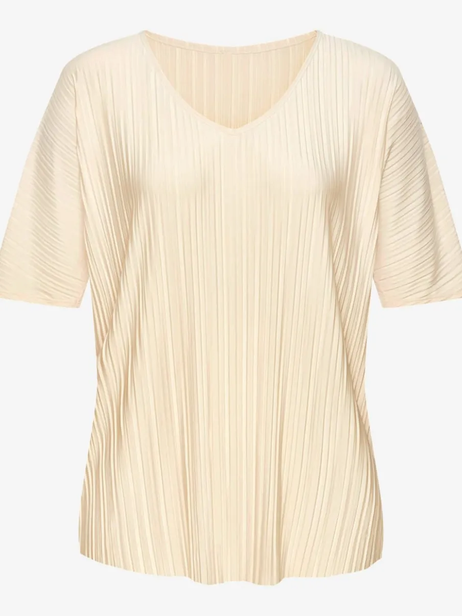 T-shirt plissé en tissu brillant avec col V et manches chauve-souris