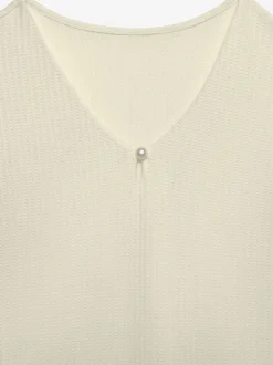 T-shirts à manches courtes avec encolure en V décorative