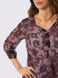 Tunique à col en V avec motifs animaliers et manches 3/4 transparentes
