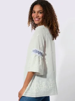 Tunique en coton avec empiècements fleuris et franges