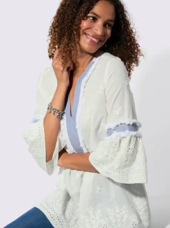 Tunique en coton avec empiècements fleuris et franges
