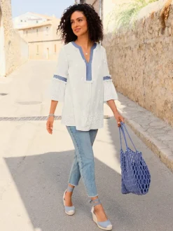 Tunique en coton avec empiècements fleuris et franges