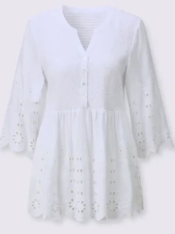 Tunique en dentelle avec empiècements et patte de boutonnage