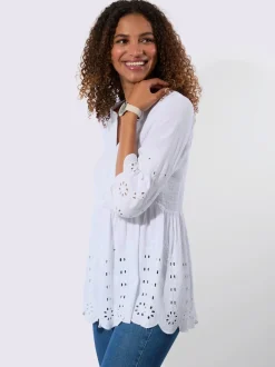 Tunique en dentelle avec empiècements et patte de boutonnage
