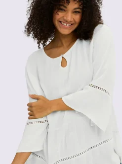 Tunique motif ajouré légèrement transparent