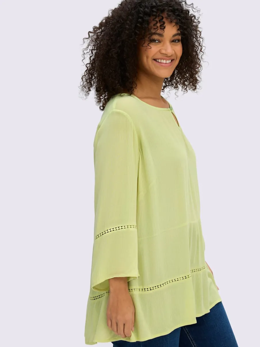 Tunique motif ajouré légèrement transparent