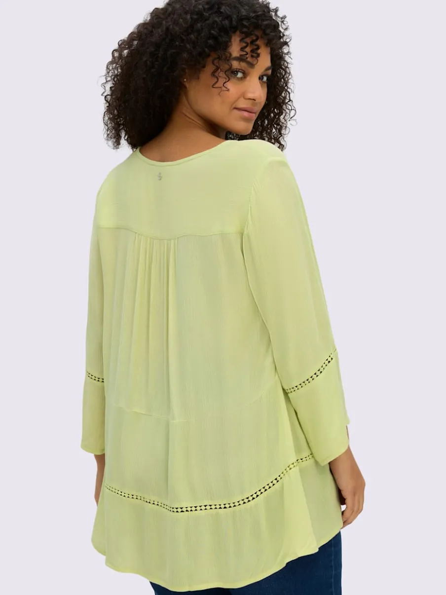 Tunique motif ajouré légèrement transparent