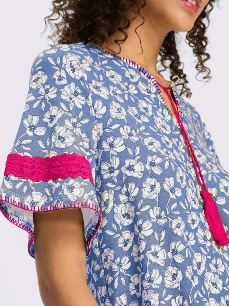 Tunique à motifs floraux avec encolure ronde et manches évasées